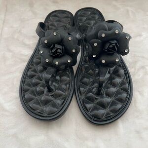 Elegant Black Sandals with Floral Design